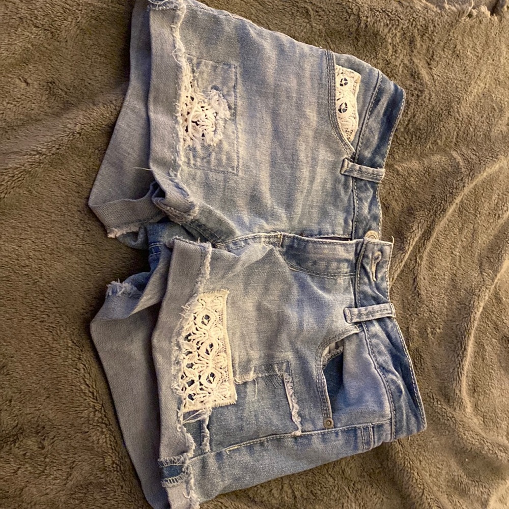 Blue denim shorts.